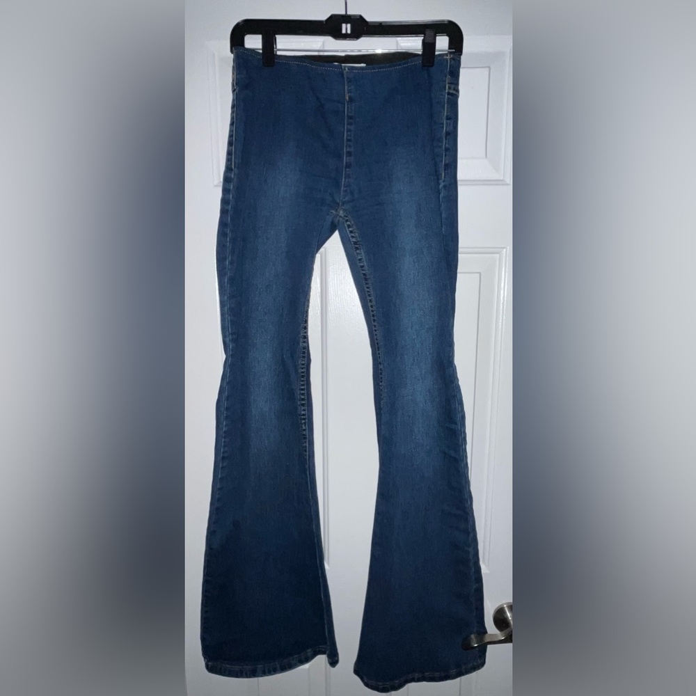 Blue bell-bottom/flare denim jeans with stretchy waist; size S, likely fit 0-2